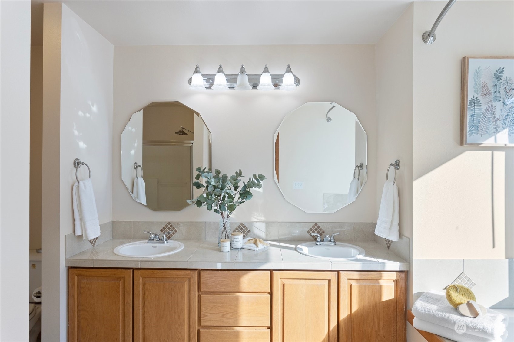 15317 Sunset Road Bothell, WA 98012 - Photo 14 of 24 a bathroom with a granite countertop sink and a mirror