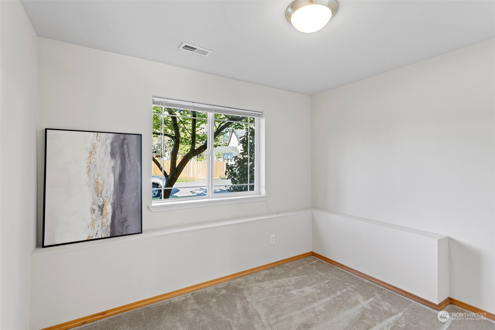 15317 Sunset Road Bothell, WA 98012 - Photo 17 of 24 a view of empty room with window