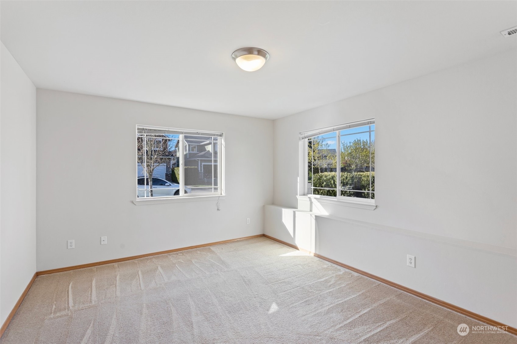 15317 Sunset Road Bothell, WA 98012 - Photo 18 of 24 an empty room with a window