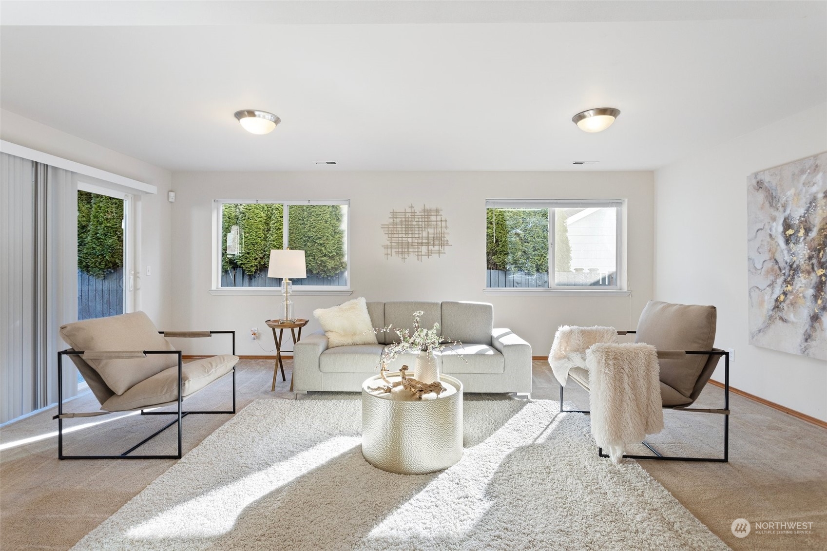 15317 Sunset Road Bothell, WA 98012 - Photo 19 of 24 a living room with furniture and a window