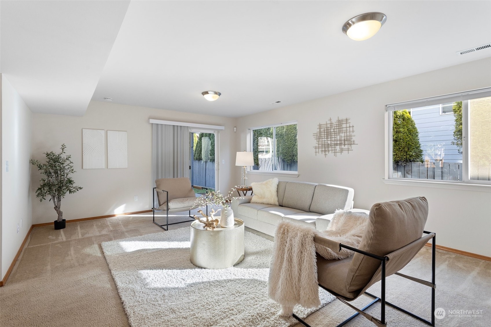 15317 Sunset Road Bothell, WA 98012 - Photo 20 of 24 a living room with furniture and a potted plant