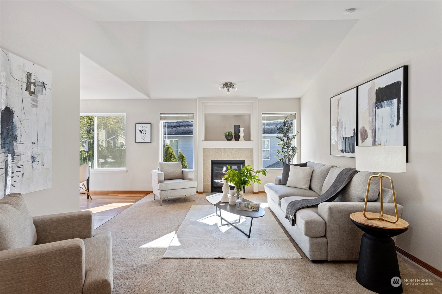 15317 Sunset Road Bothell, WA 98012 - Photo 2 of 24 a living room with furniture and a fireplace