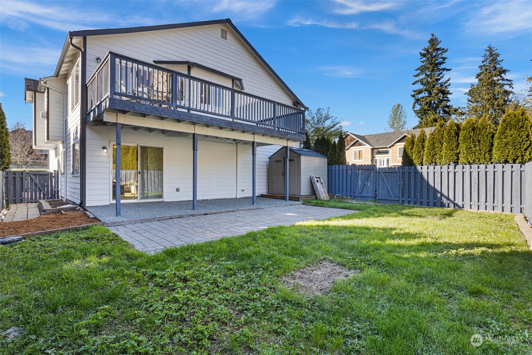15317 Sunset Road Bothell, WA 98012 - Photo 23 of 24 a view of an house with backyard and garden