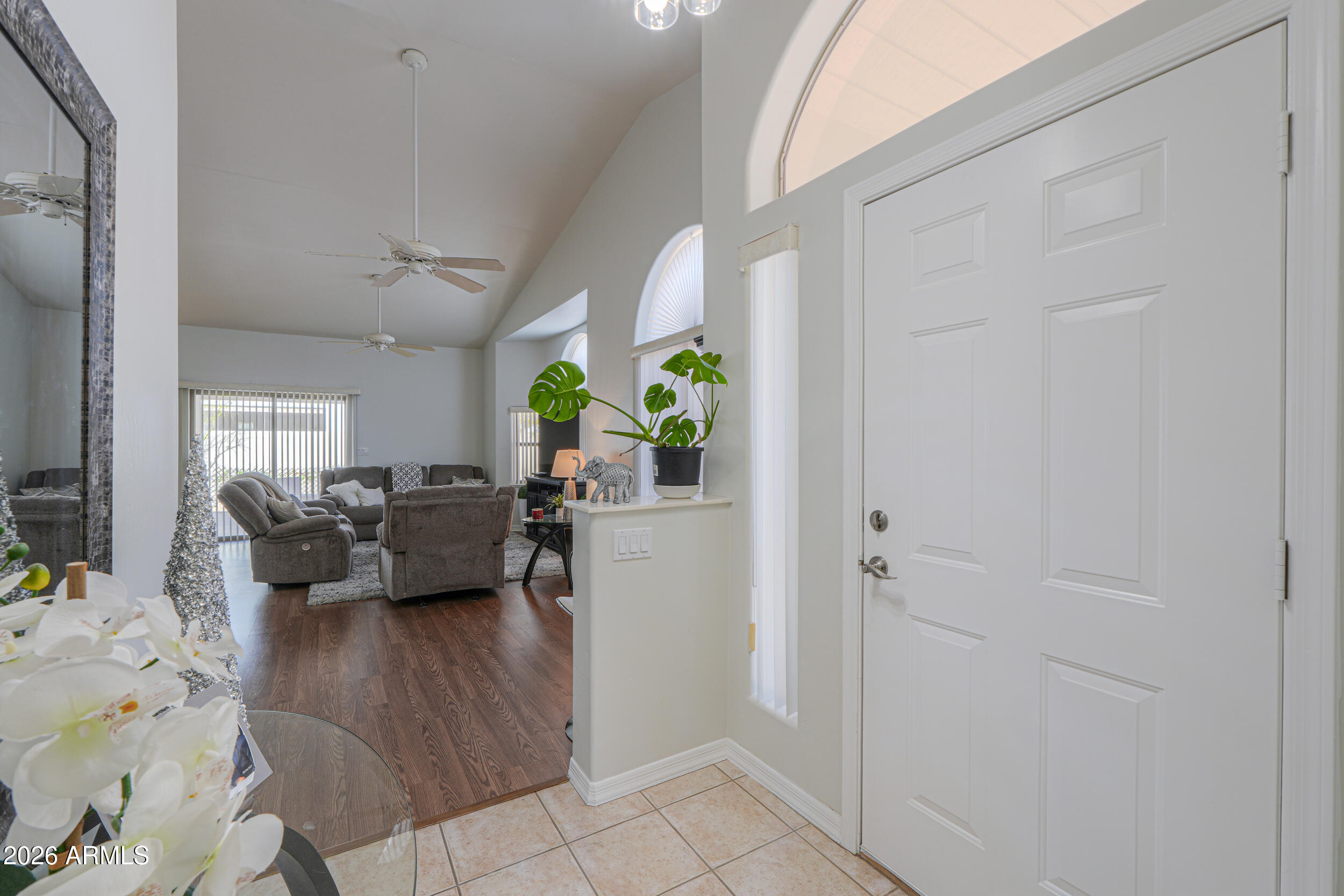 5830 East McKellips Road, Unit 27 Mesa, AZ 85215 - Photo 10 of 47 a living room with furniture and a table