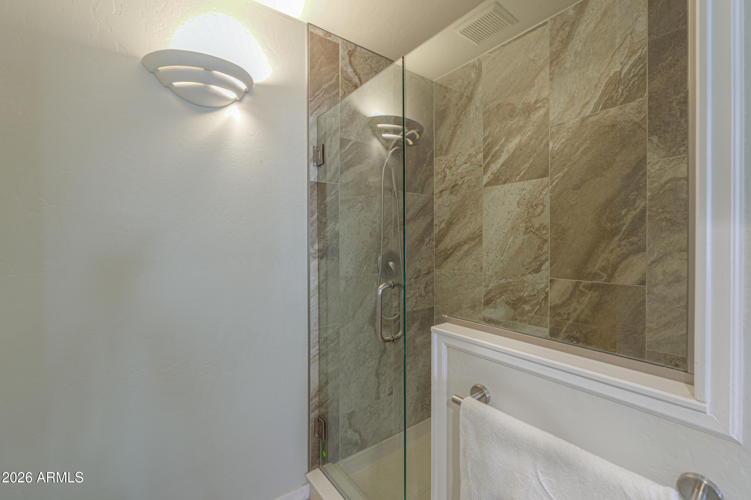 5830 East McKellips Road, Unit 27 Mesa, AZ 85215 - Photo 21 of 47 a bathroom with a shower