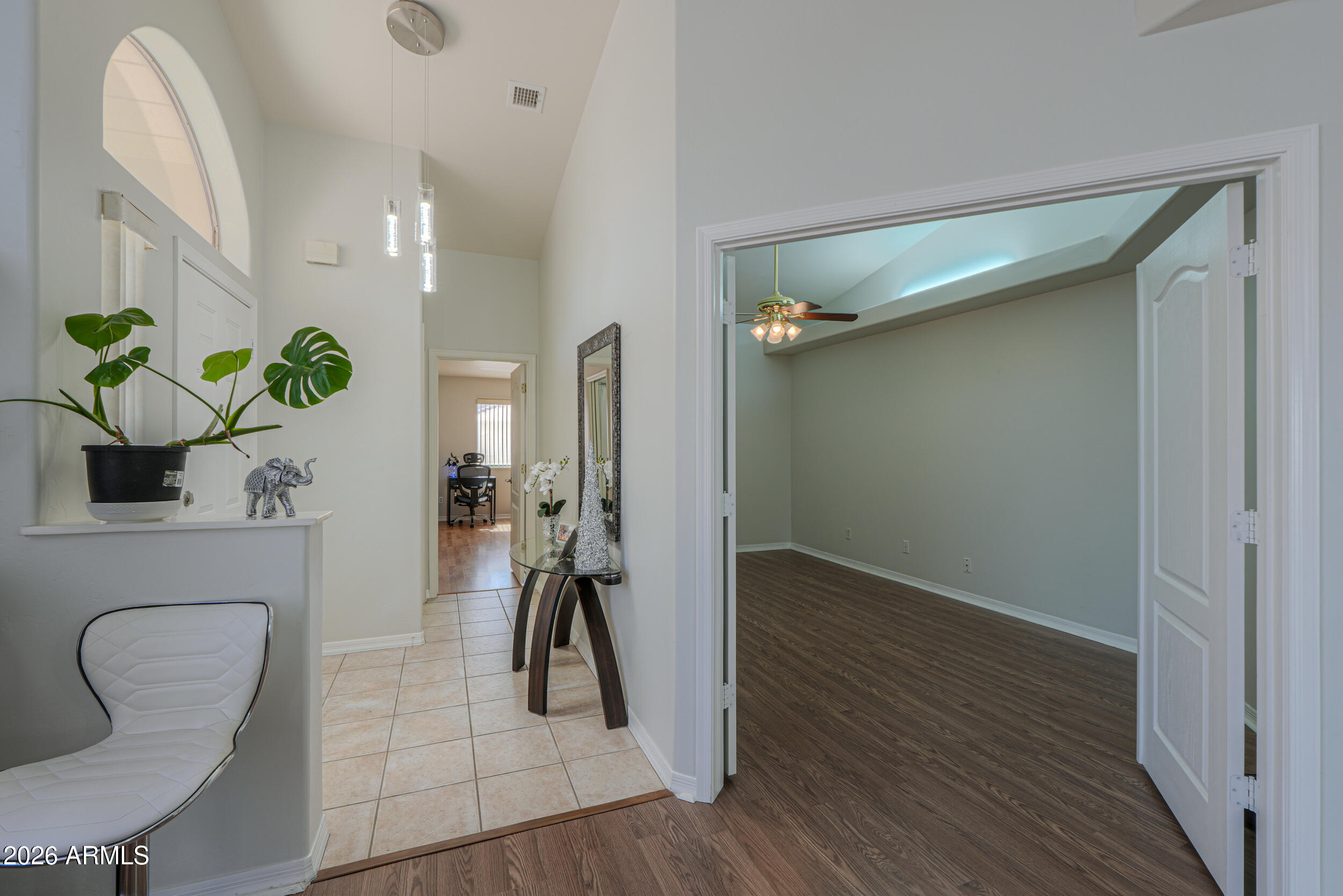 5830 East McKellips Road, Unit 27 Mesa, AZ 85215 - Photo 23 of 47 a view of entryway with wooden floor