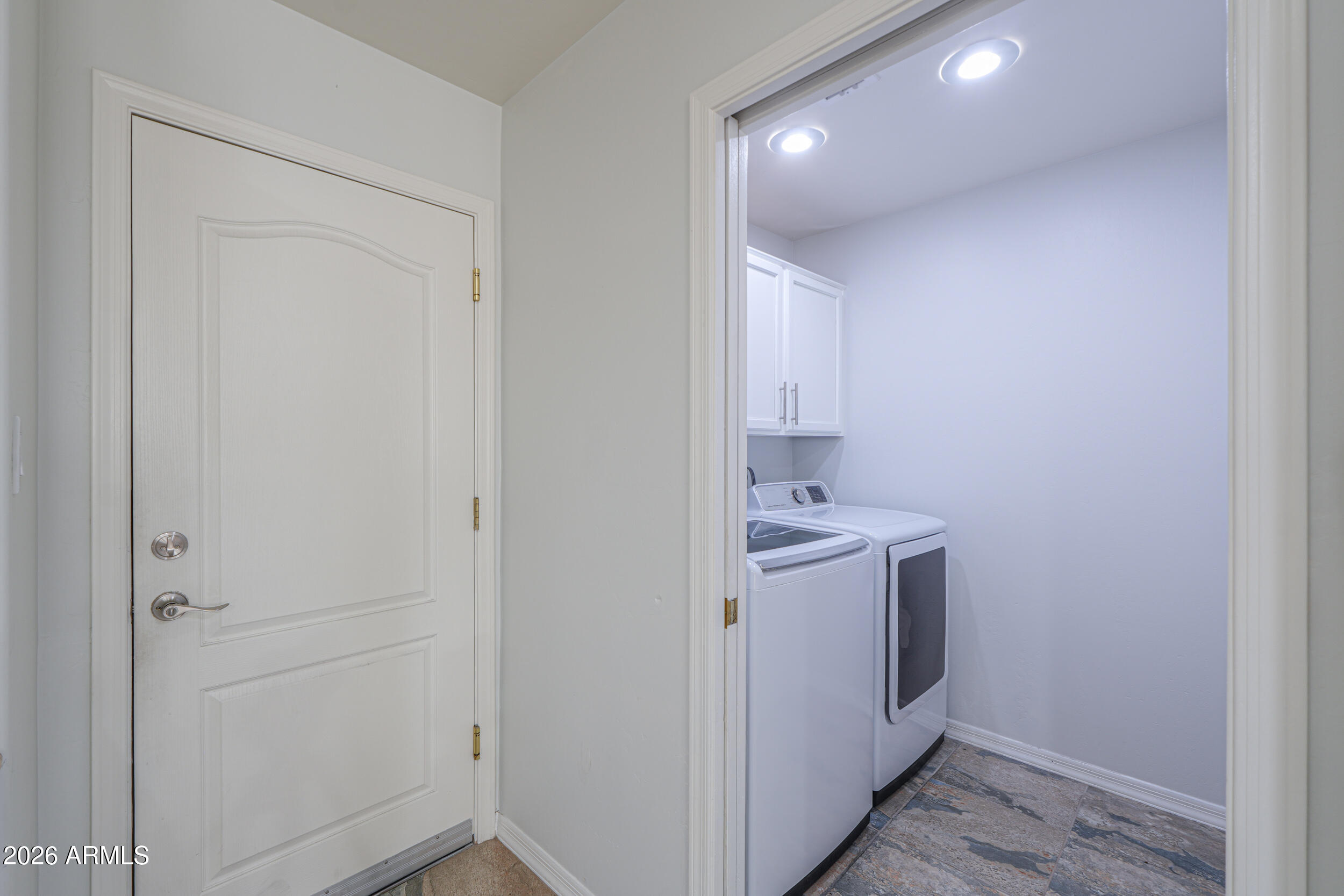 5830 East McKellips Road, Unit 27 Mesa, AZ 85215 - Photo 30 of 47 a view of a storage & utility room with a sink