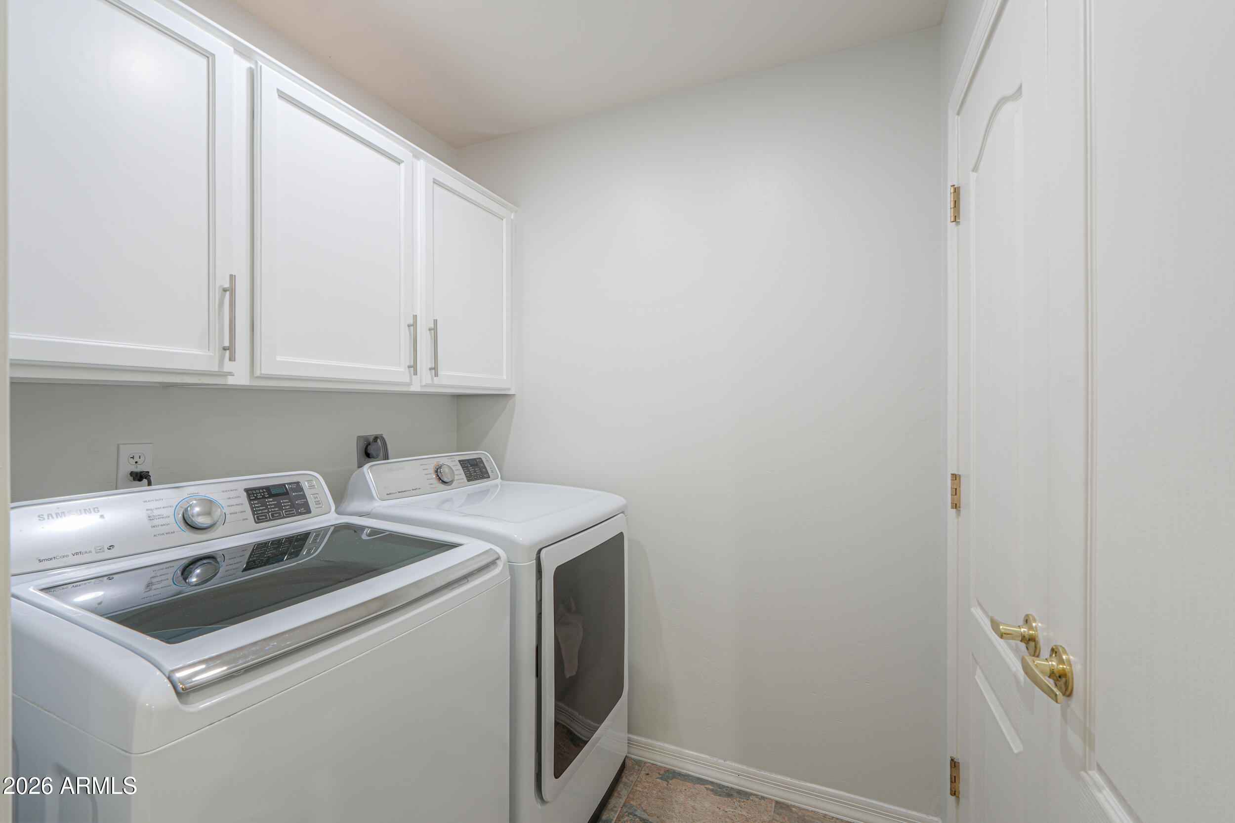 5830 East McKellips Road, Unit 27 Mesa, AZ 85215 - Photo 31 of 47 a utility room with dryer and washer