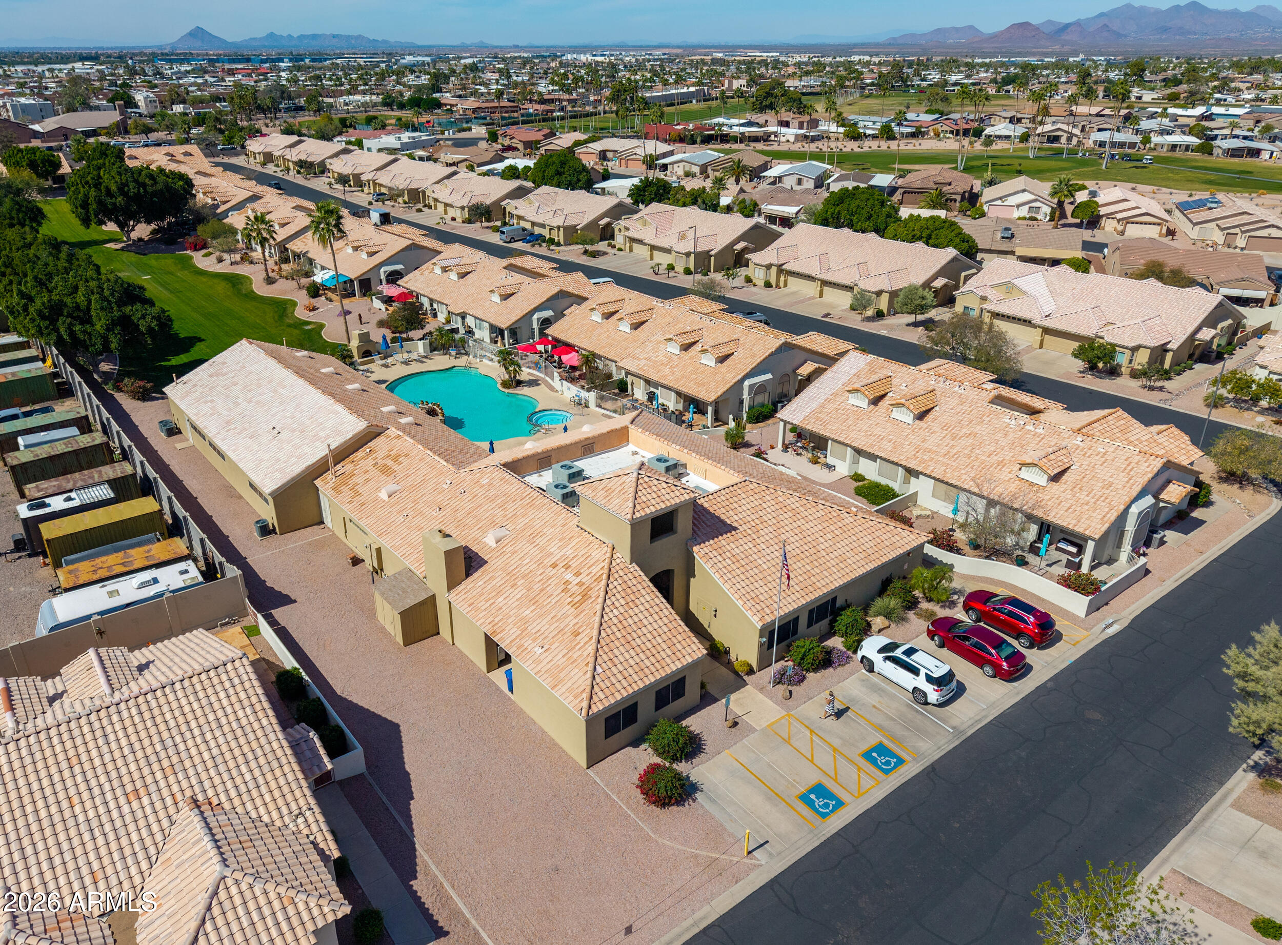 5830 East McKellips Road, Unit 27 Mesa, AZ 85215 - Photo 43 of 47 an aerial view of a city with lots of residential buildings