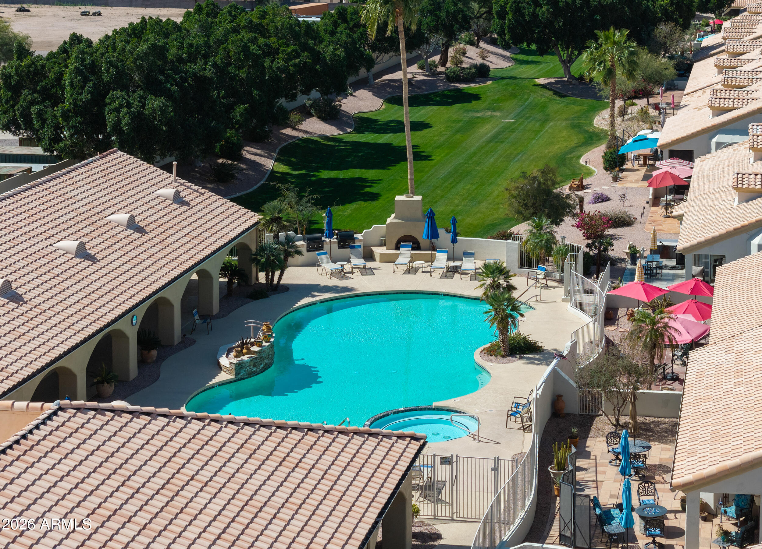 5830 East McKellips Road, Unit 27 Mesa, AZ 85215 - Photo 45 of 47 a view of a backyard with sitting area