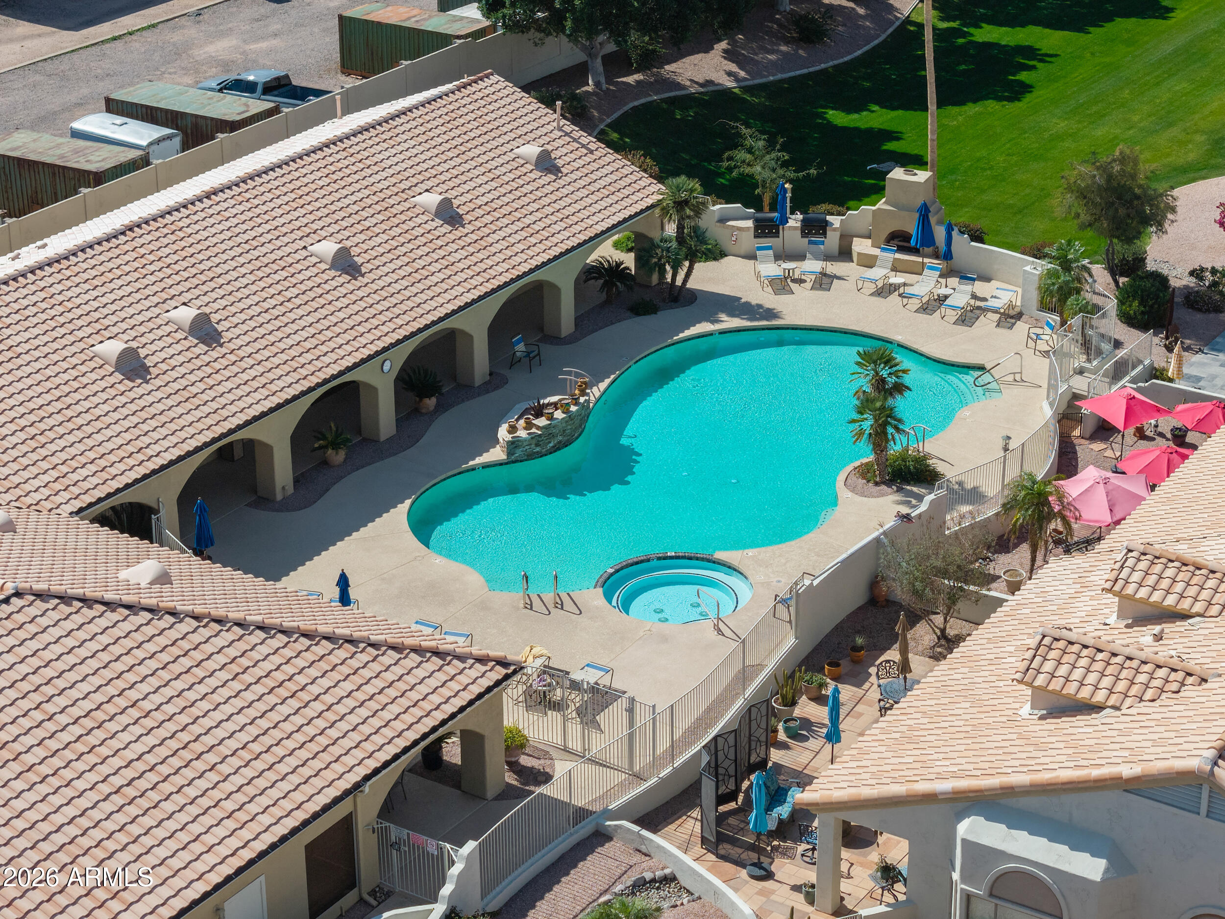5830 East McKellips Road, Unit 27 Mesa, AZ 85215 - Photo 46 of 47 swimming pool view with a seating space
