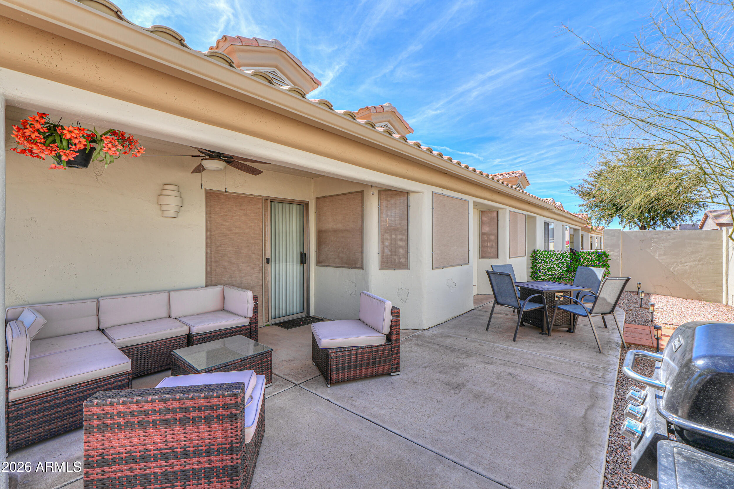 5830 East McKellips Road, Unit 27 Mesa, AZ 85215 - Photo 6 of 47 a outdoor living space with furniture