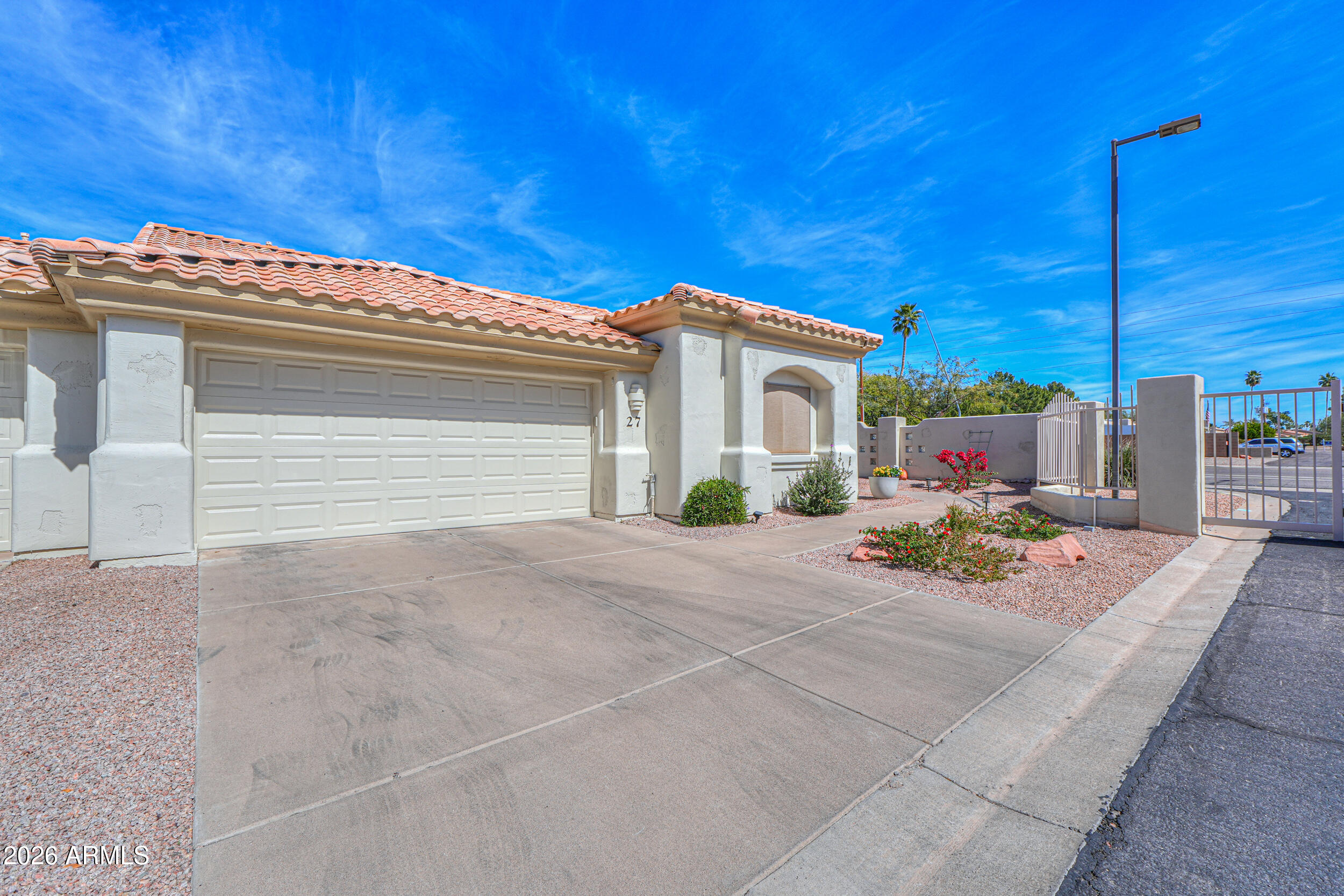 5830 East McKellips Road, Unit 27 Mesa, AZ 85215 - Photo 7 of 47 a view of backyard of a house