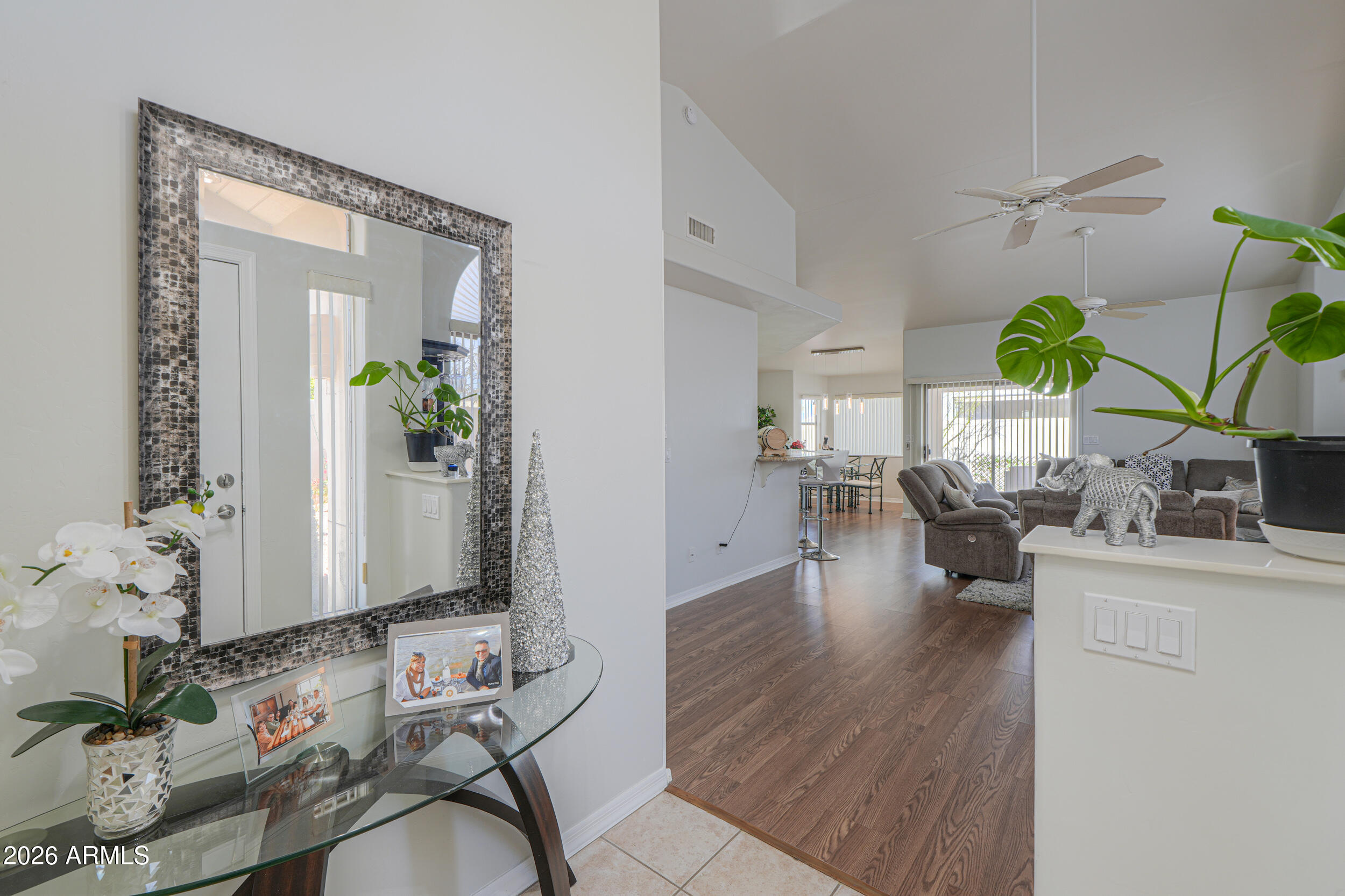5830 East McKellips Road, Unit 27 Mesa, AZ 85215 - Photo 9 of 47 a living room with furniture and wooden floor