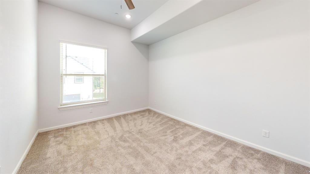 336 Buck Ridge Drive Frisco, TX 75068 - Photo 16 of 23 Carpeted interior space featuring a window with blinds, a ceiling fan, and recessed lighting