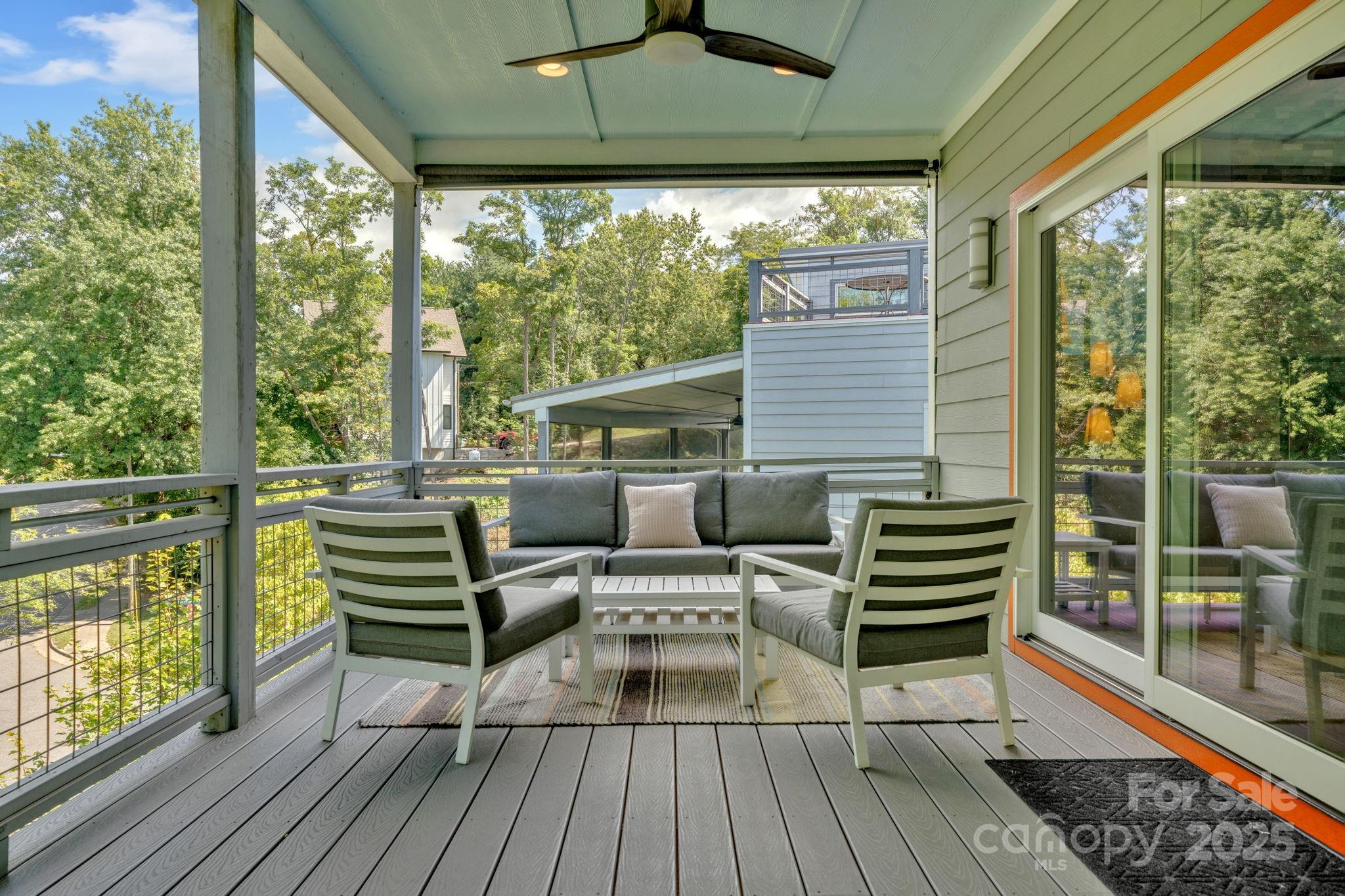 8 Birdhouse Row Asheville, NC 28801 - Photo 26 of 46 a outdoor view with a sitting space
