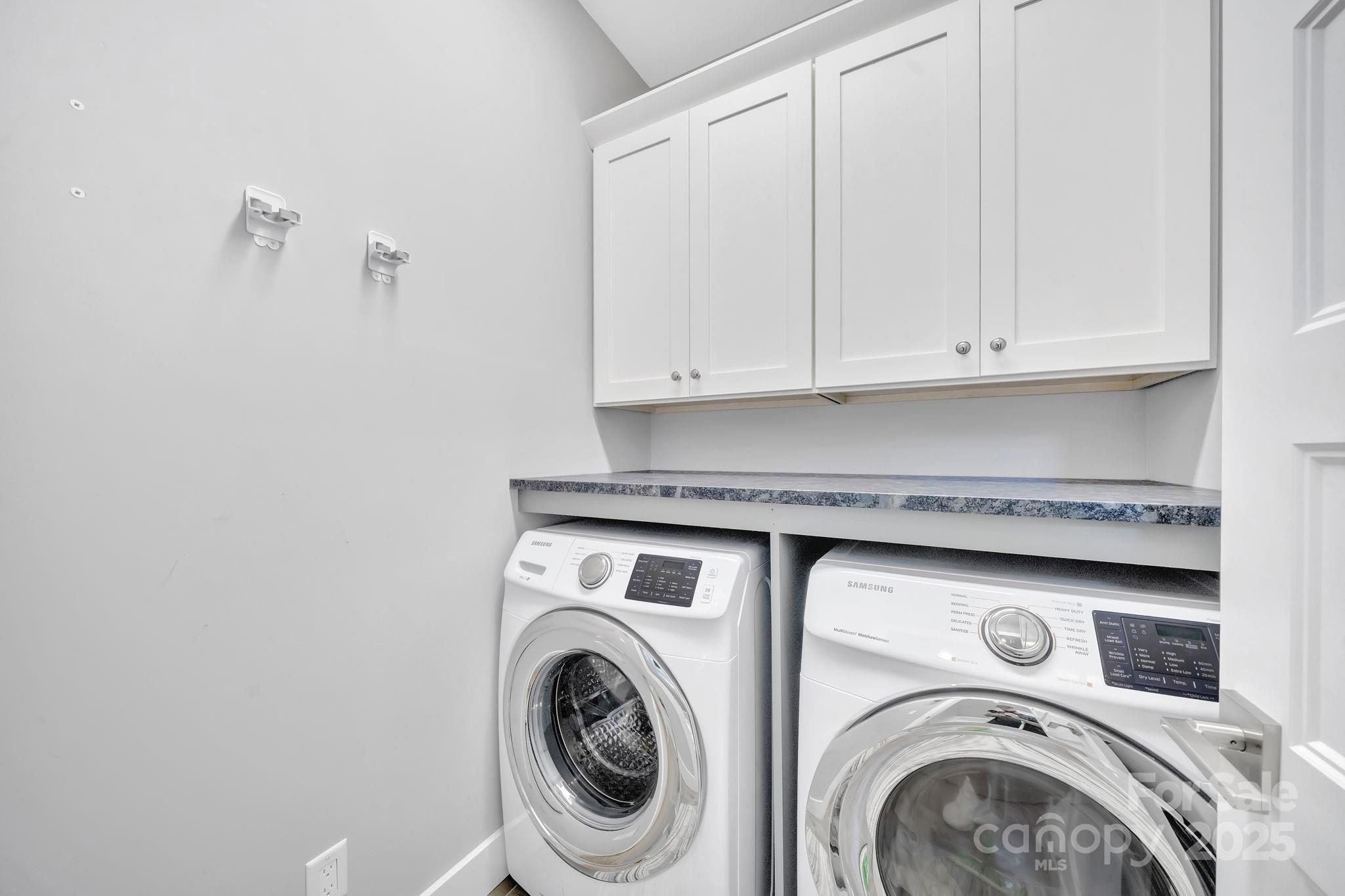 8 Birdhouse Row Asheville, NC 28801 - Photo 44 of 46 a utility room with dryer and washer
