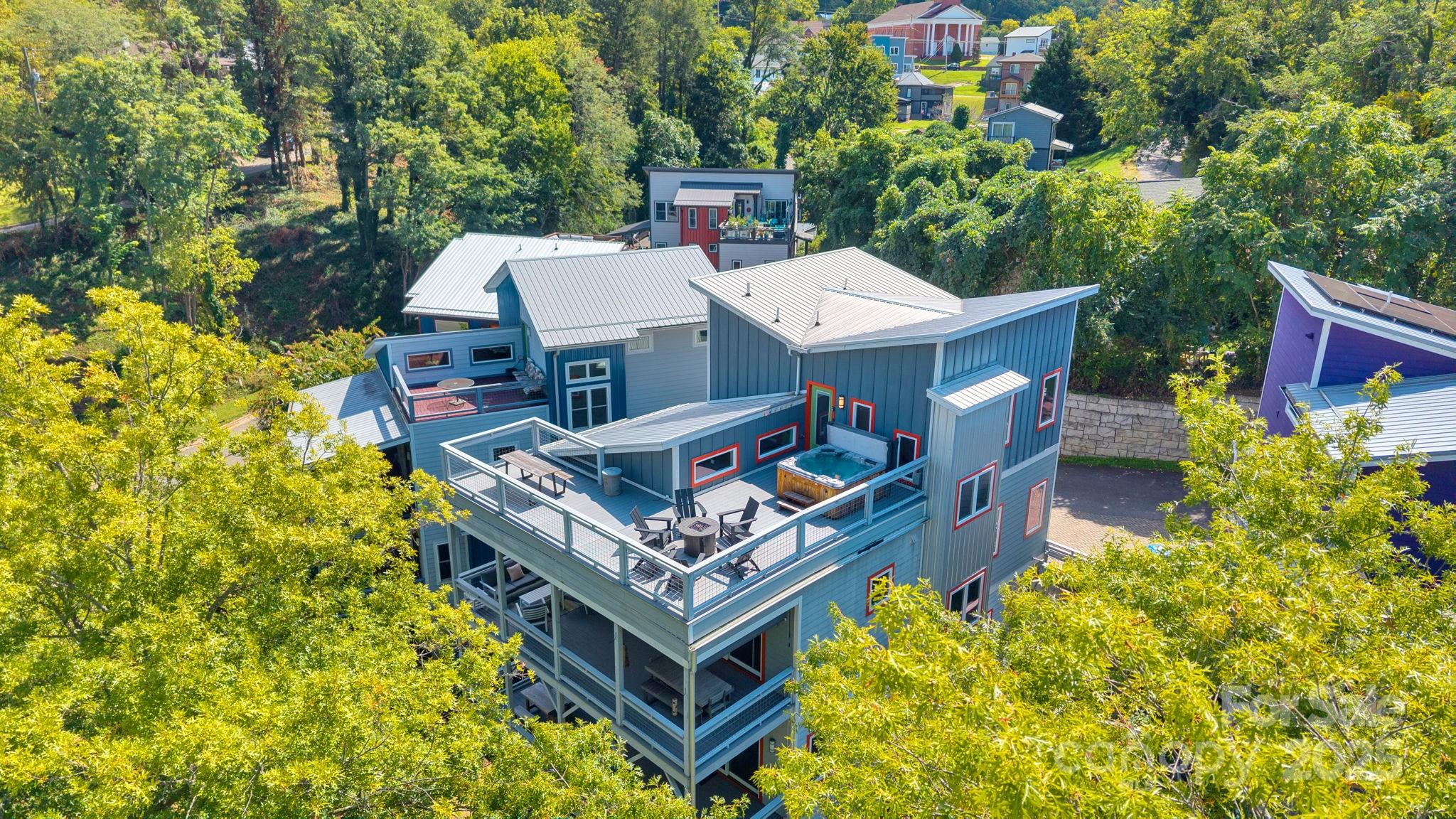 8 Birdhouse Row Asheville, NC 28801 - Photo 8 of 46 an aerial view of a house with swimming pool and garden