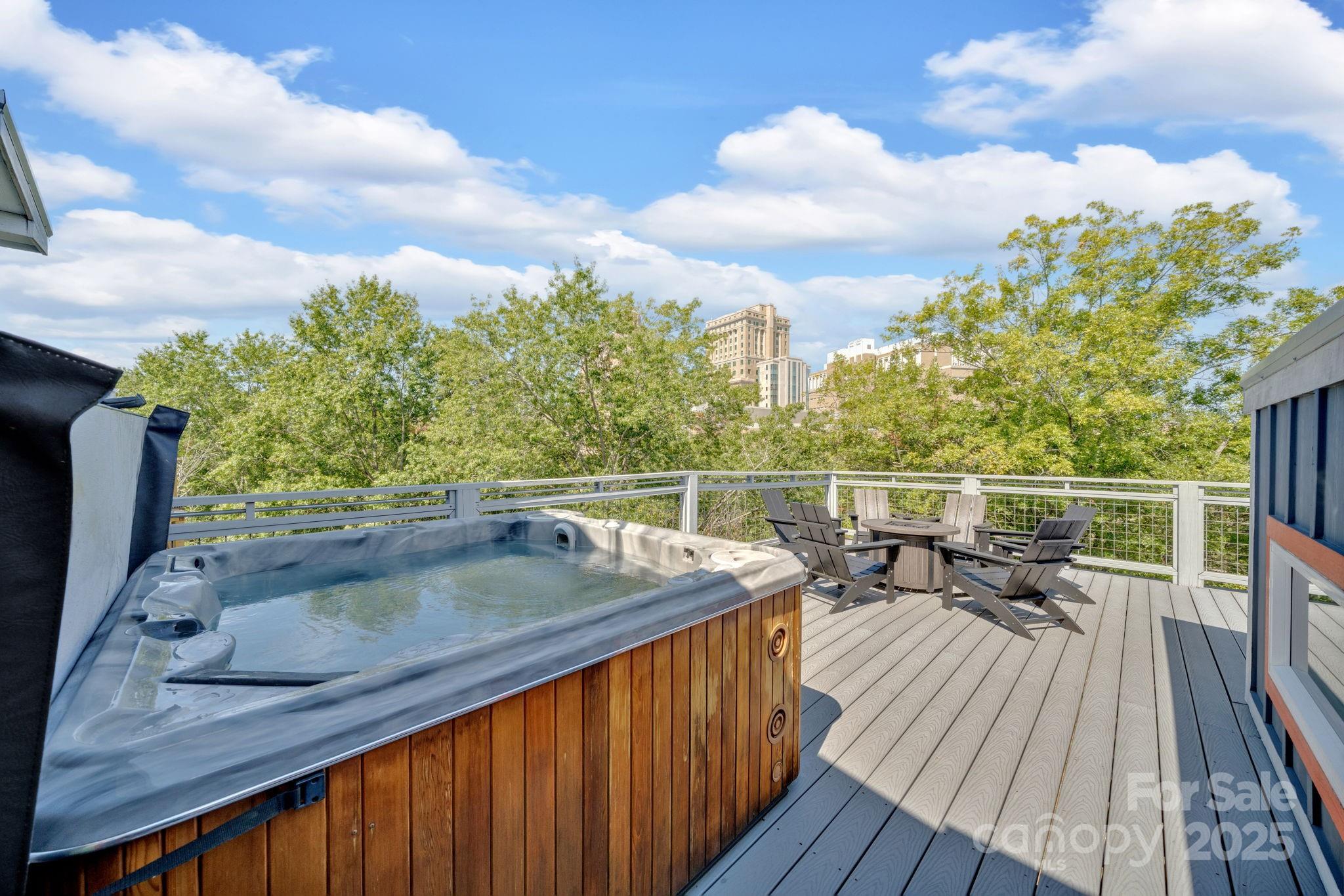 8 Birdhouse Row Asheville, NC 28801 - Photo 10 of 46 a view of roof deck with wooden floor and fence