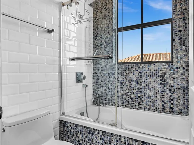 a bathroom with a sink and a bathtub