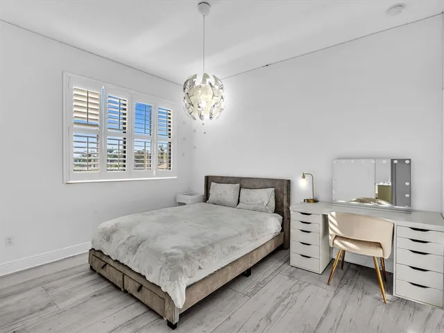 a bathroom with a double vanity sink and mirror