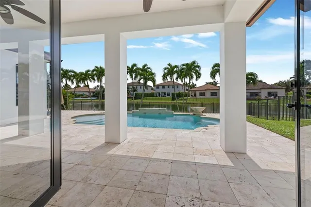 a view of a porch with a floor to ceiling window