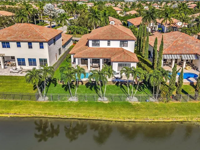a view of a swimming pool with a lounge chair