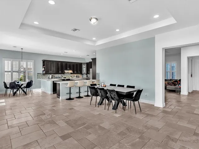 a kitchen with counter top space cabinets and stainless steel appliances