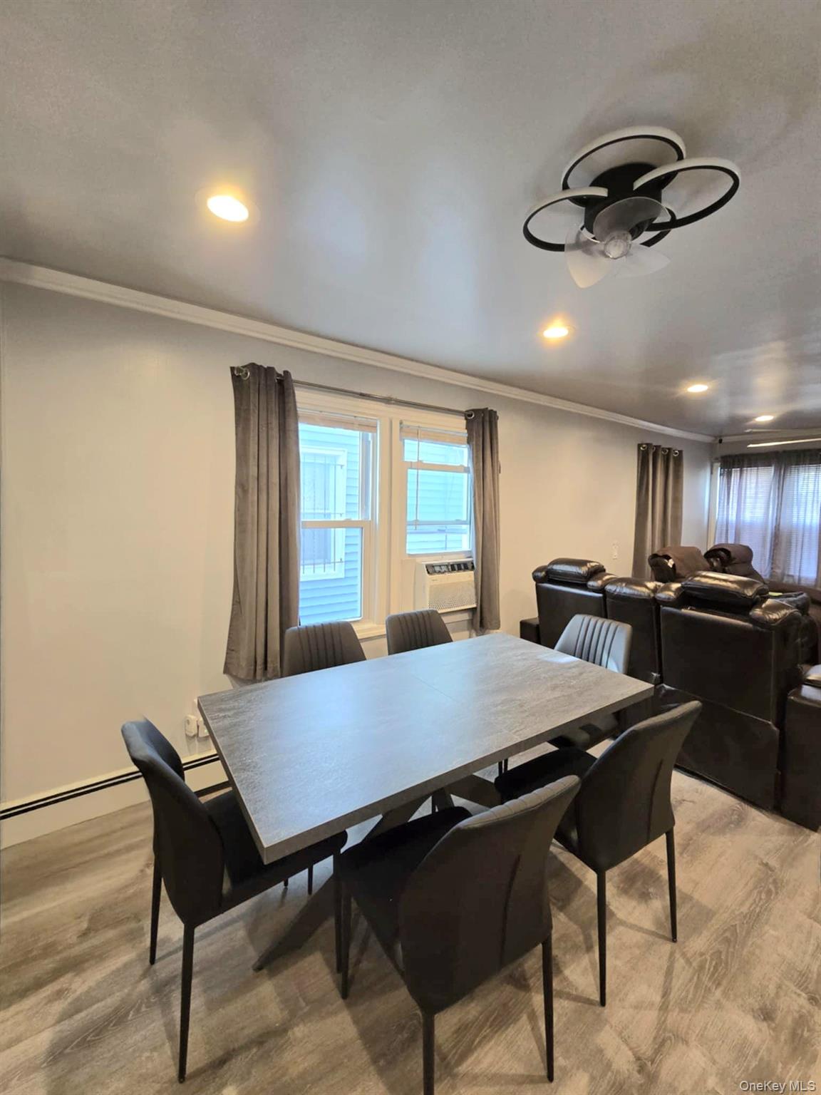 111-18 124th Street Queens, NY 11420 - Photo 12 of 16 a view of a dining room with furniture