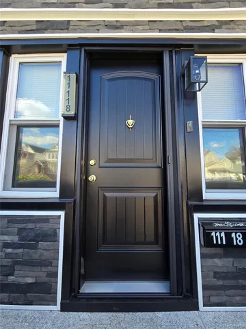 a kitchen with a appliances a stove a sink and a cabinets