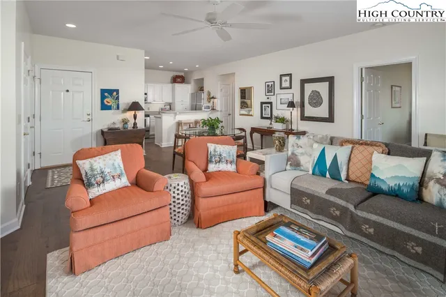 a living room with furniture or kitchen view and a couch