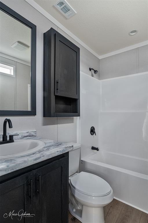 607 Nettleton Drive Princeton, LA 71067 - Photo 9 of 14 a bathroom with a granite countertop toilet sink and mirror