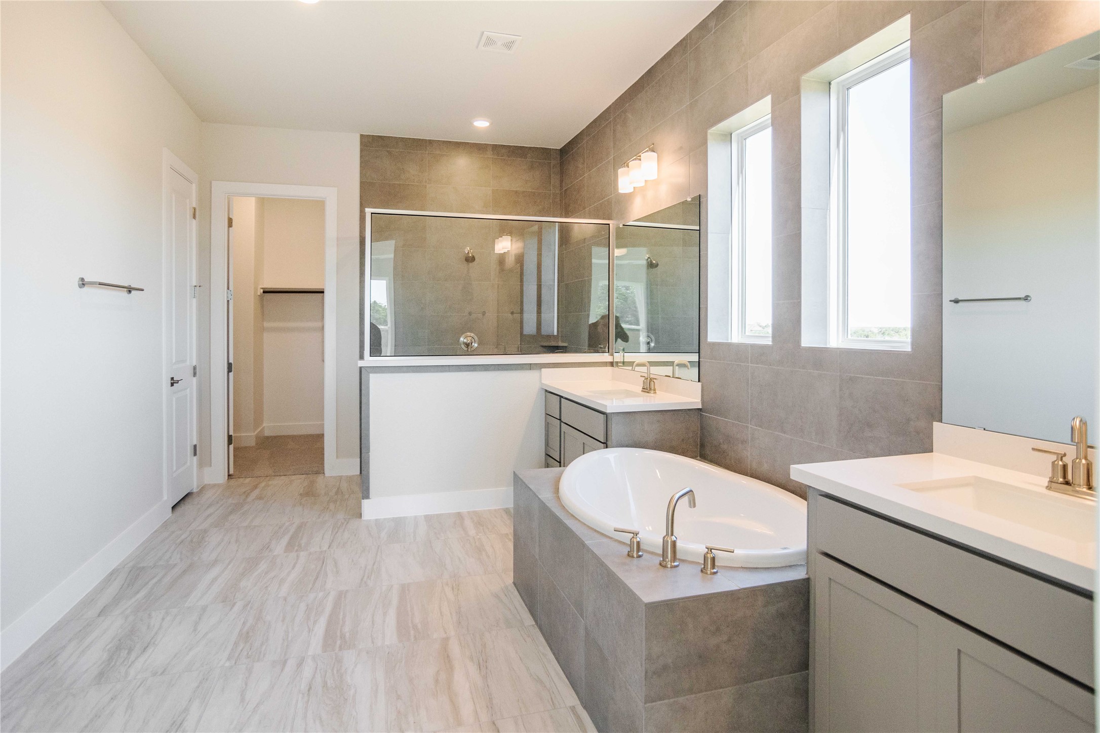 1252 Lavender Way Georgetown, TX 78628 - Photo 11 of 23 a bathroom with a tub sink and mirror