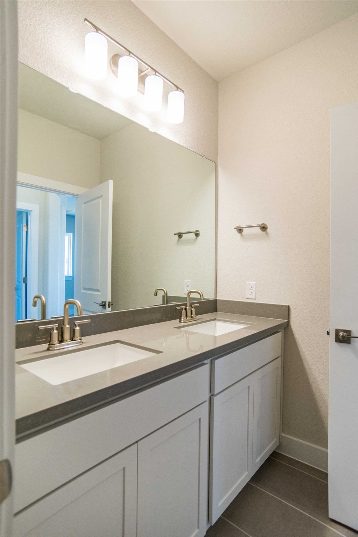 1252 Lavender Way Georgetown, TX 78628 - Photo 15 of 23 a bathroom with a sink and a mirror