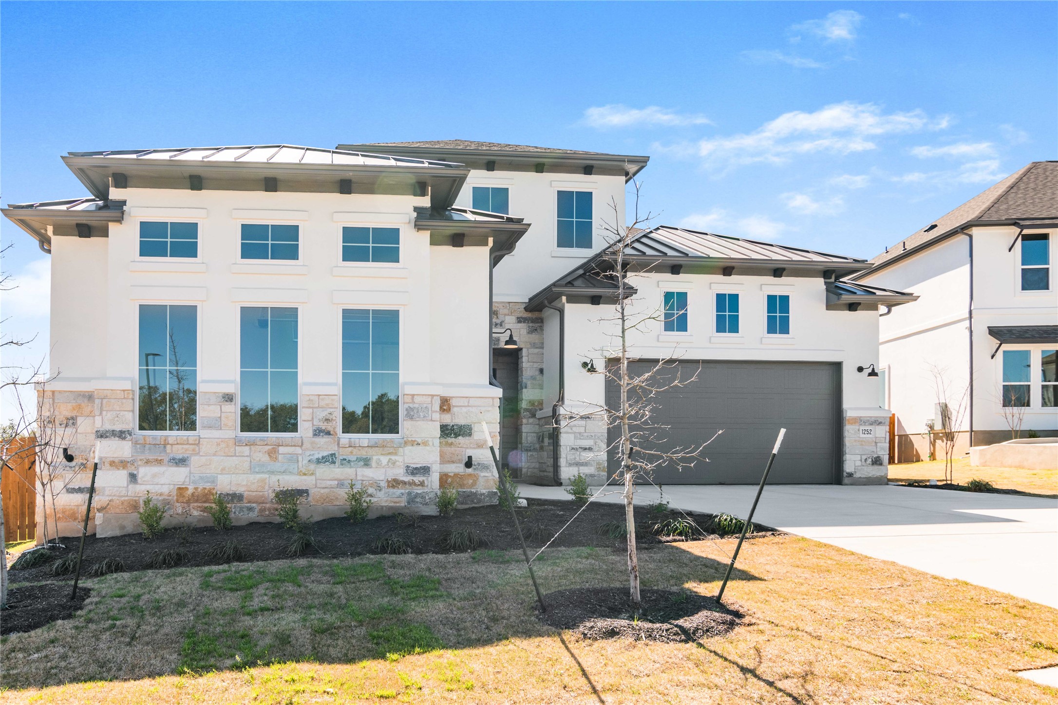1252 Lavender Way Georgetown, TX 78628 - Photo 2 of 23 a front view of a house with entertaining space