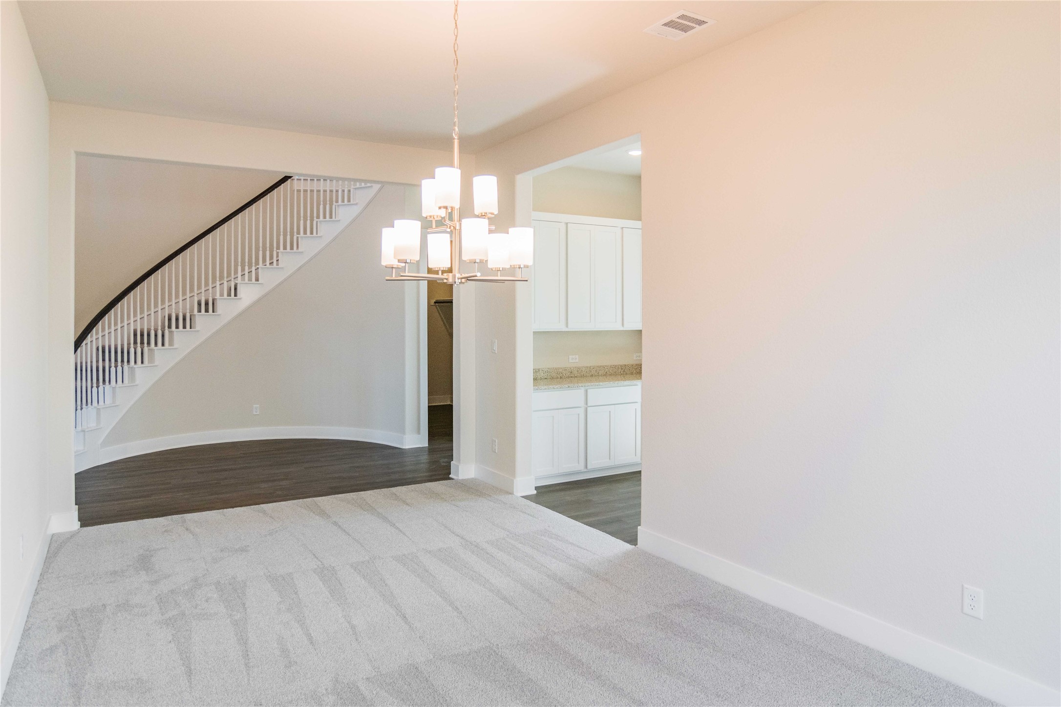 1252 Lavender Way Georgetown, TX 78628 - Photo 6 of 23 a view of entryway and hall with a chandelier