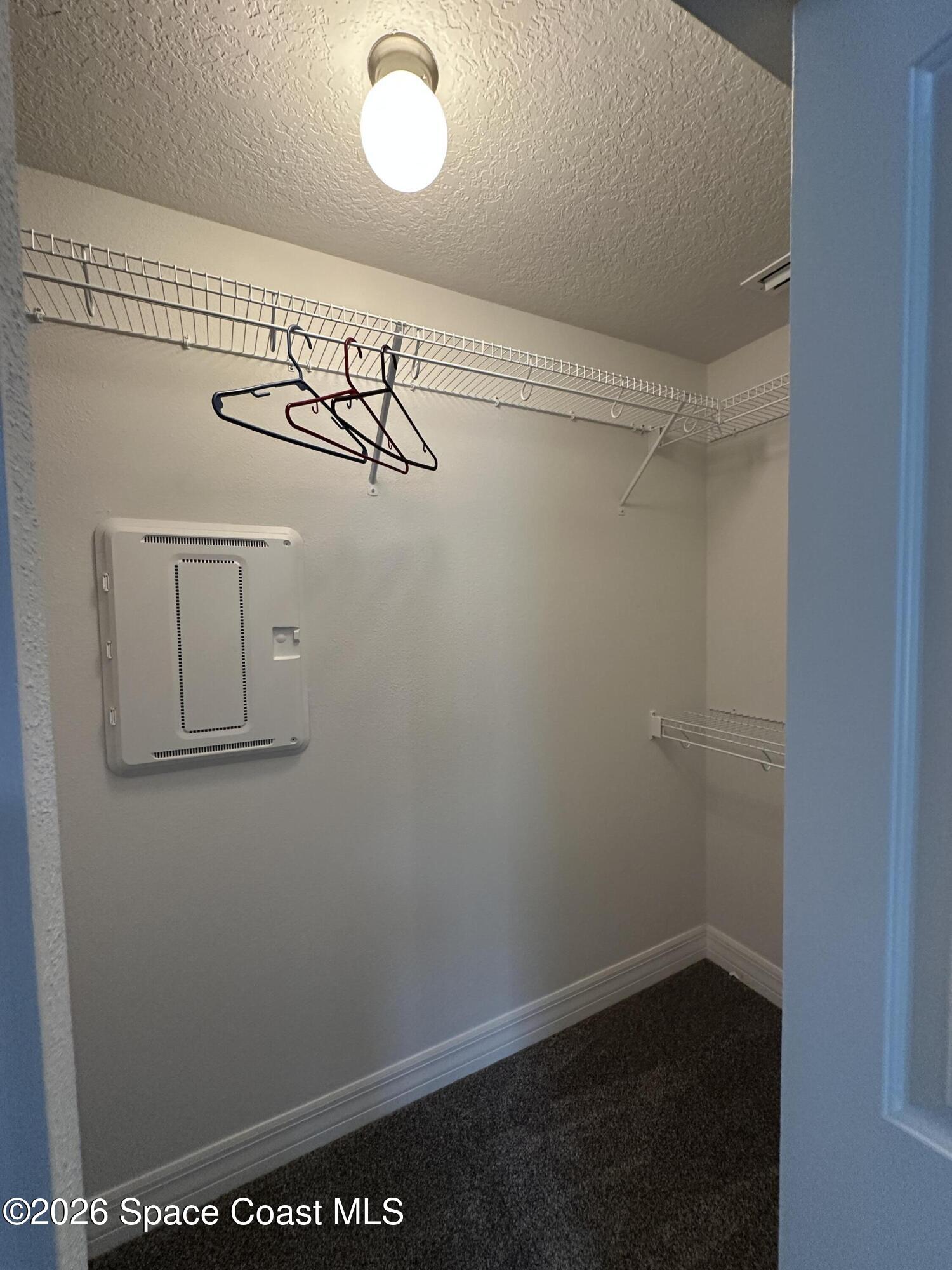 650 Rockinghorse Road Melbourne, FL 32935 - Photo 13 of 16 a view of a rack on the wall