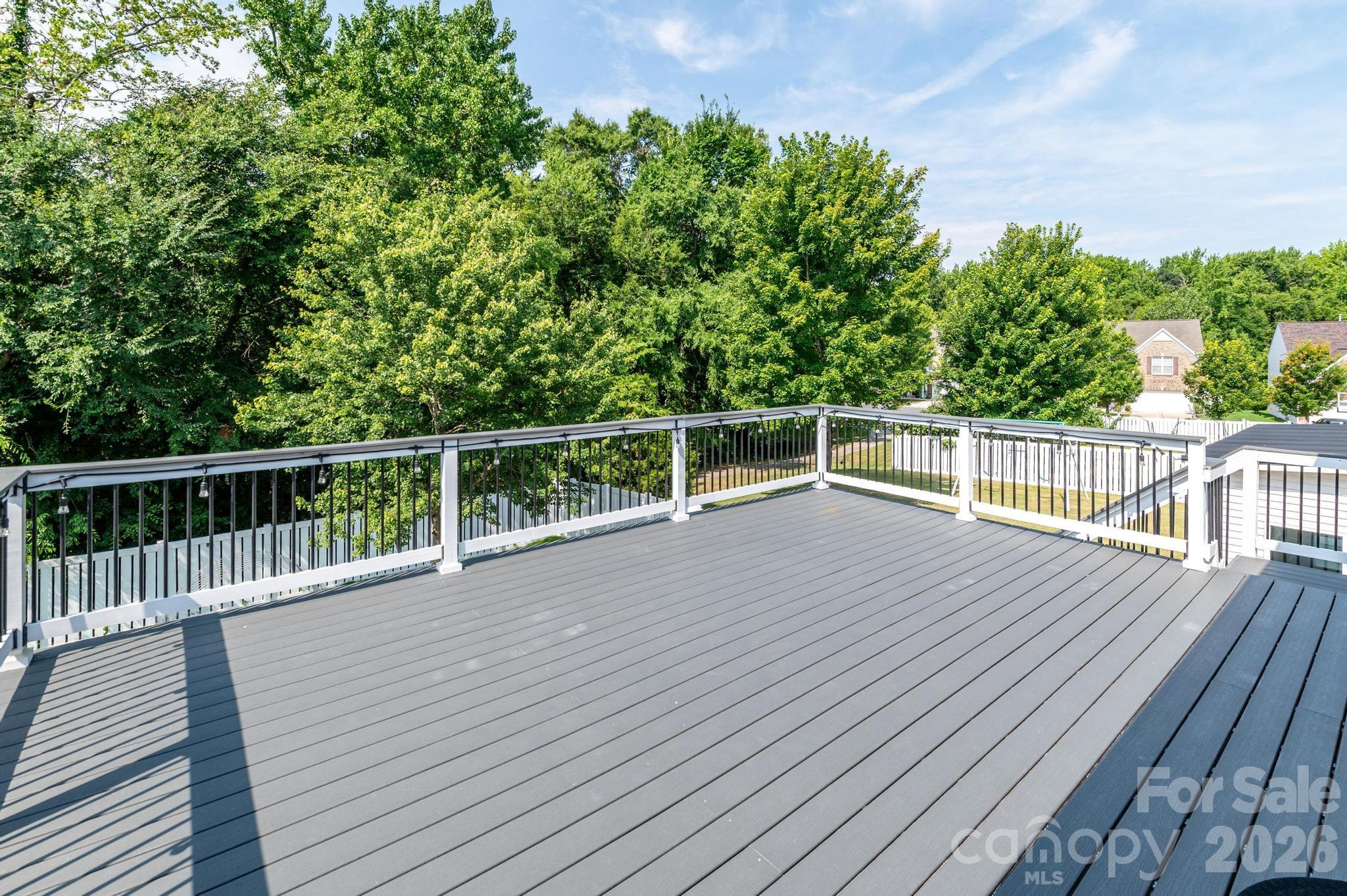 8212 Ruby Valley Road Charlotte, NC 28277 - Photo 9 of 40 a view of a wooden deck