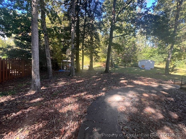 7905 Harps Mill Road Raleigh, NC 27615 - Photo 10 of 13 a view of a yard with trees