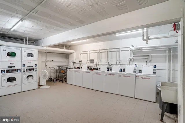 a kitchen with cabinets and window