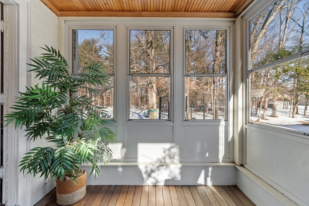 45 Main Street Chelmsford, MA 01863 - Photo 26 of 42 a view of a flower pot on a table near a window