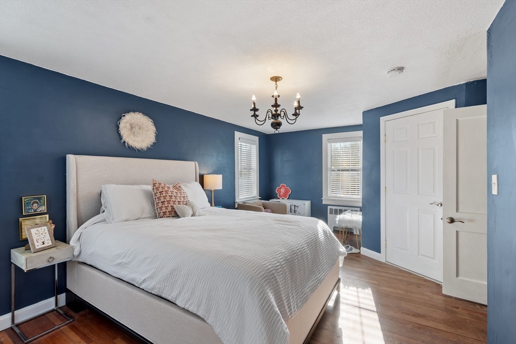 45 Main Street Chelmsford, MA 01863 - Photo 31 of 42 a bedroom with a bed and a window