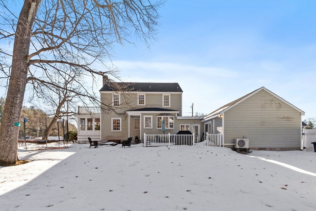 45 Main Street Chelmsford, MA 01863 - Photo 4 of 42 a street view covered with snow in front of house