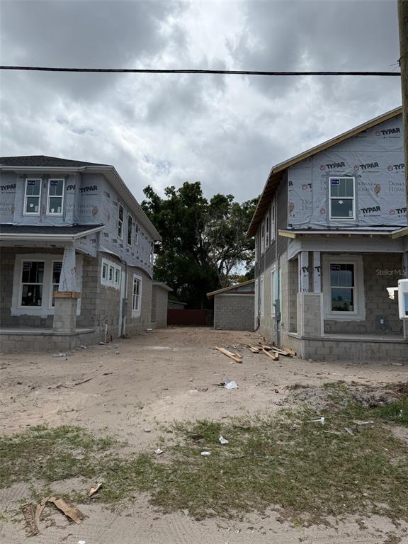 1526 West Arch Street Tampa, FL 33607 - Photo 12 of 12 a front view of a house with a yard