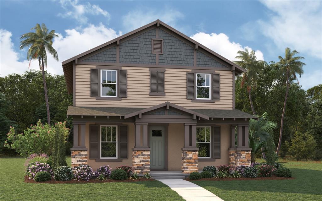 1526 West Arch Street Tampa, FL 33607 - Photo 2 of 12 a front view of a house with a yard and potted plants