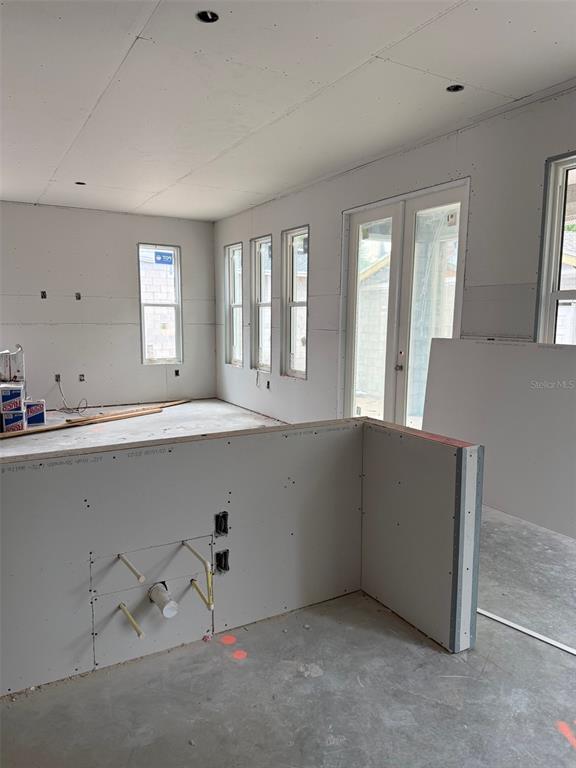 1526 West Arch Street Tampa, FL 33607 - Photo 6 of 12 a living room with furniture and window