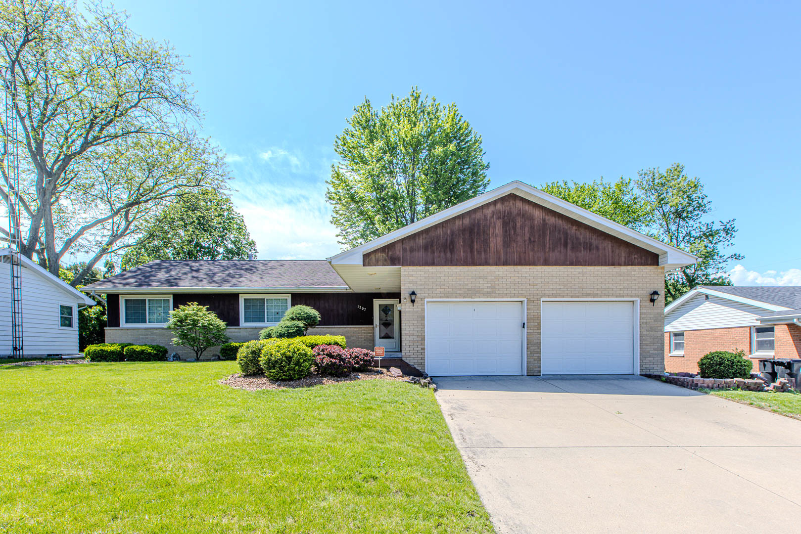 1207 Russell Street Normal, IL 61761 - Photo 1 of 23 a front view of house with yard and green space