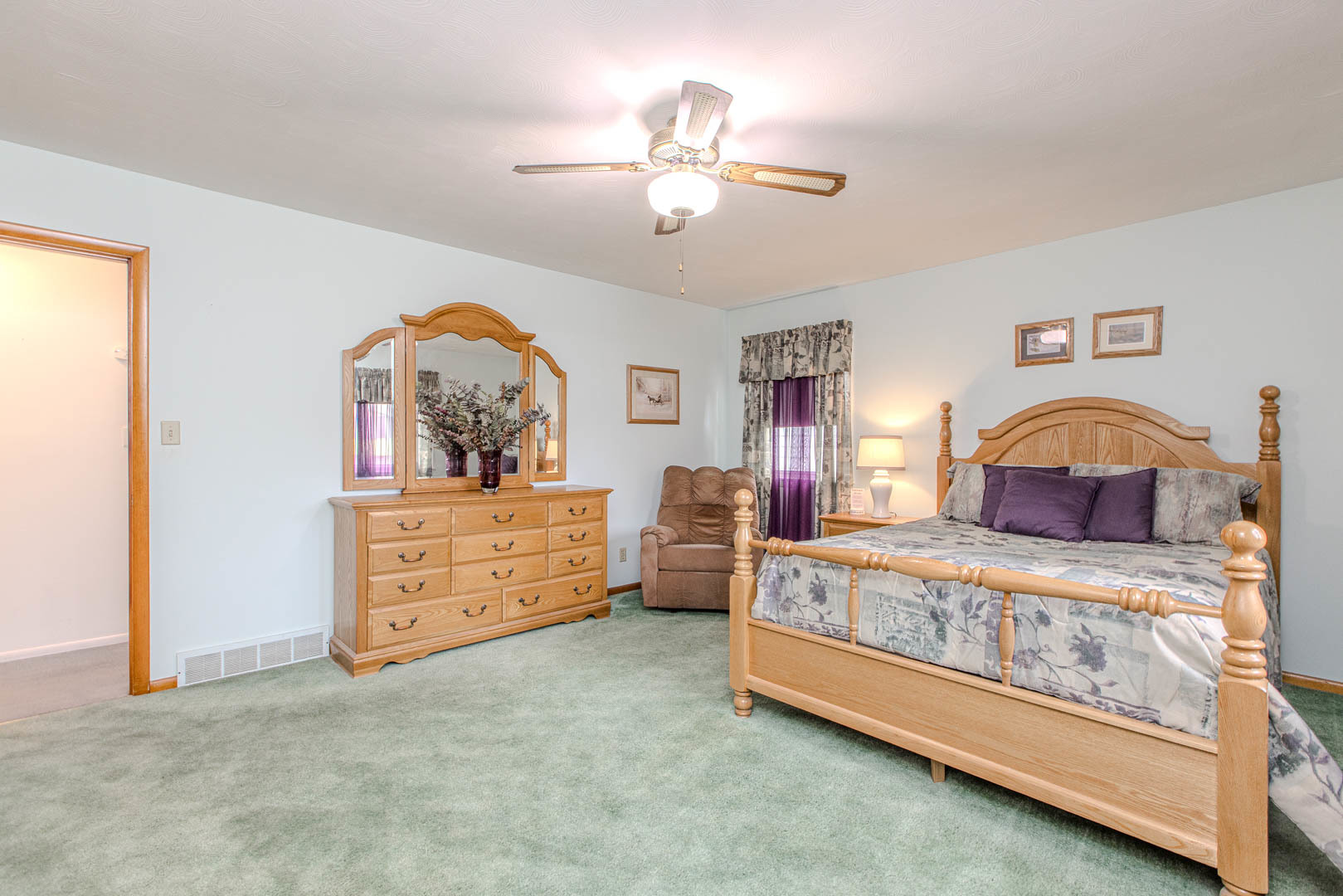 1207 Russell Street Normal, IL 61761 - Photo 12 of 23 a bedroom with a bed and a dresser