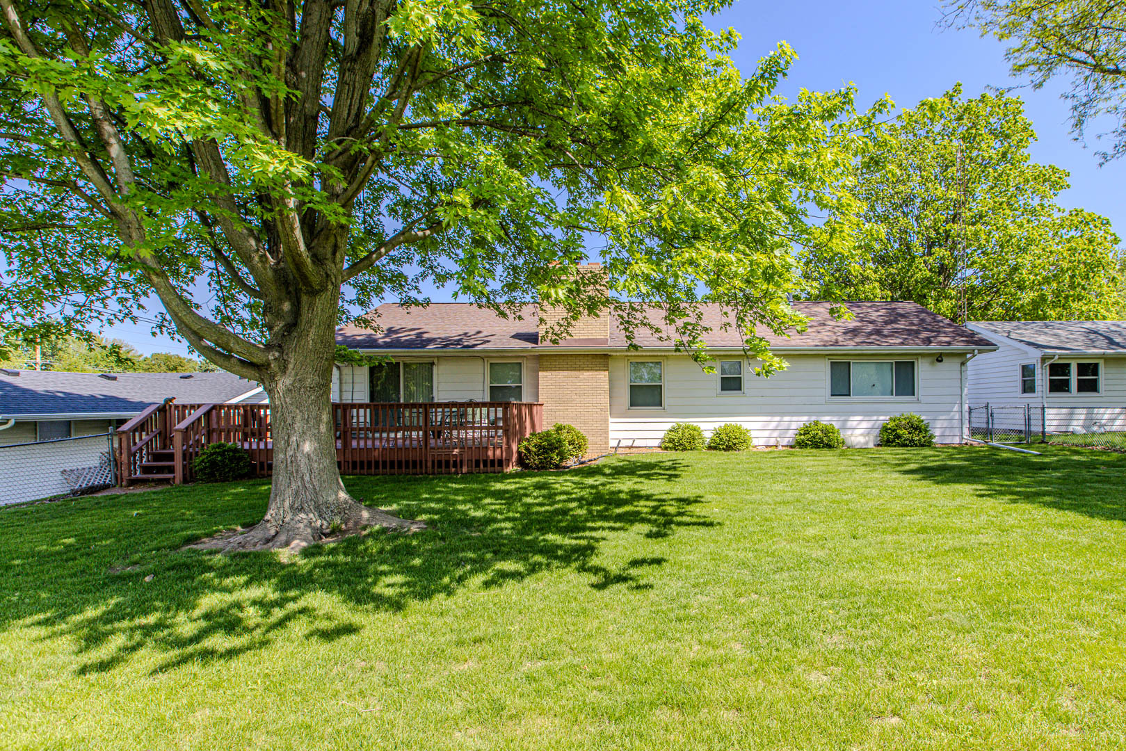1207 Russell Street Normal, IL 61761 - Photo 20 of 23 a front view of a house with a garden