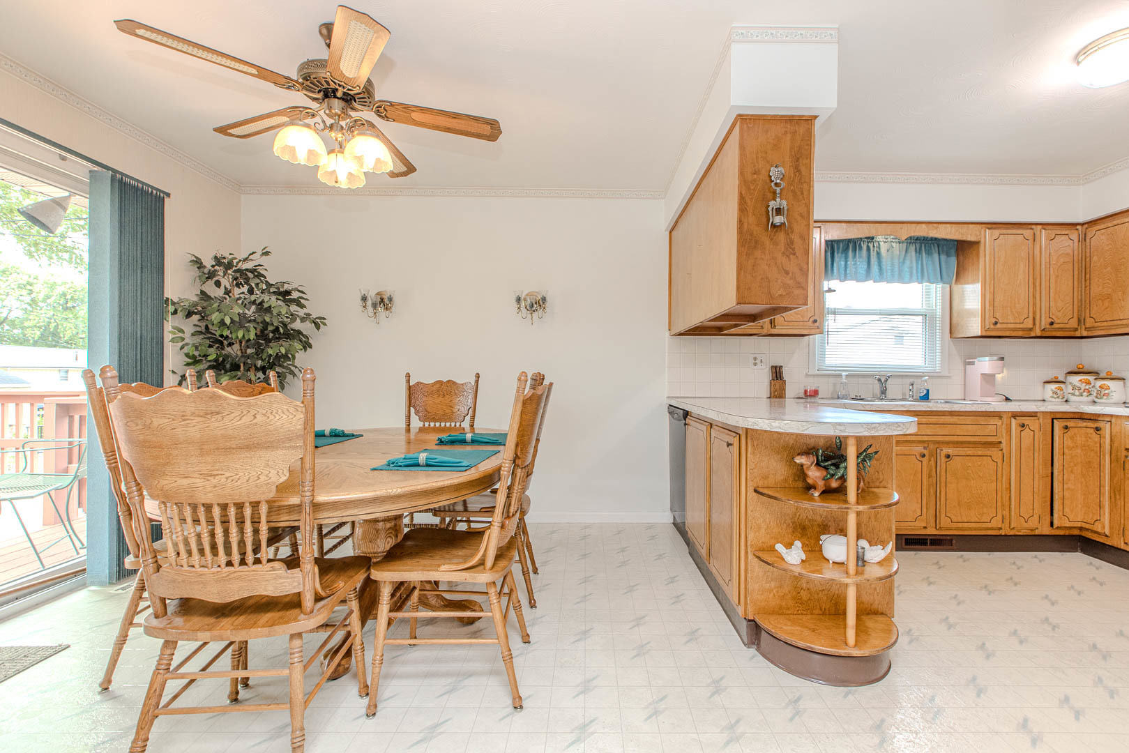 1207 Russell Street Normal, IL 61761 - Photo 9 of 23 a view of a dining room with furniture and a chandelier